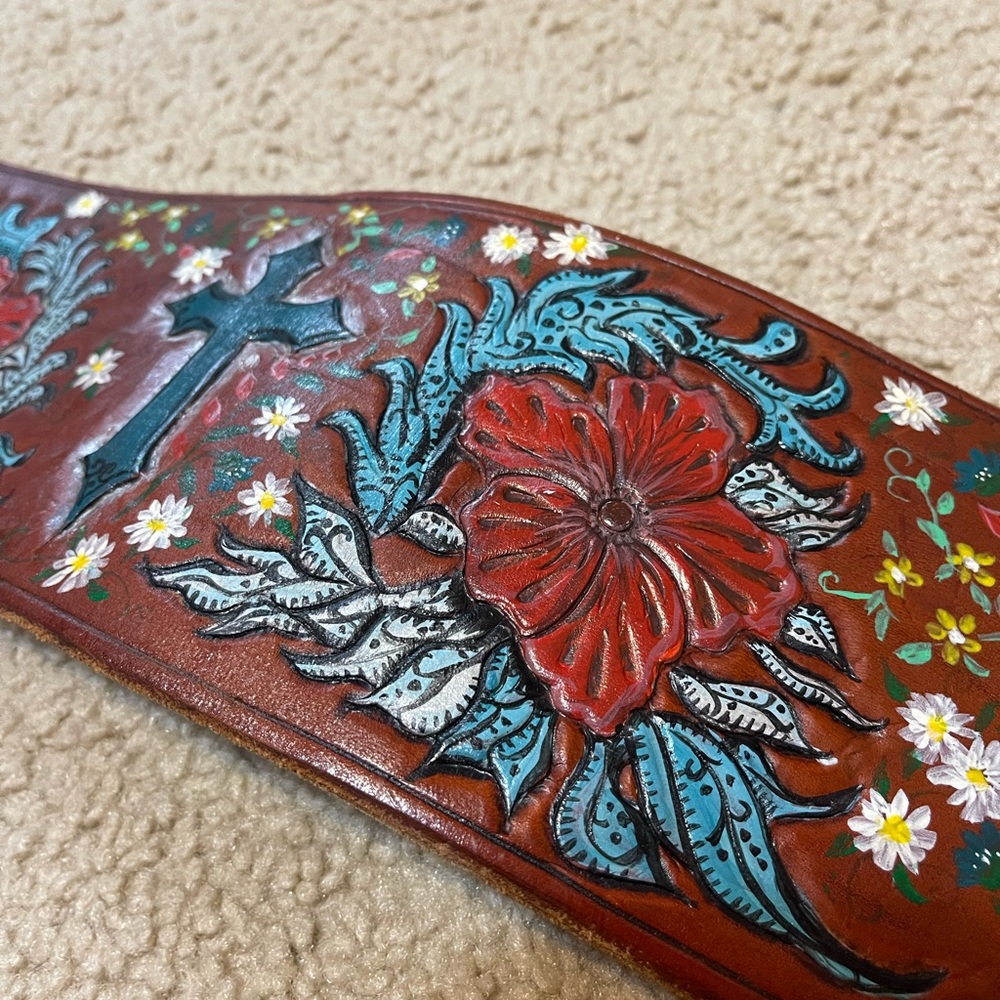 Custom leather tooled belt 38” and buckle hole at 34.75”. Can add more holes